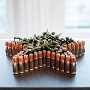 Christina Zwart, "Order/Chaos," 2012, bullets, plastic army men, 9.5 square inches. Photo credit: Greg Case.